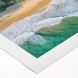 Vibrant rolled canvas artwork depicting a serene beach landscape at sunset, showcasing soft waves and colorful skies, ideal for home decor or beach-themed interiors.