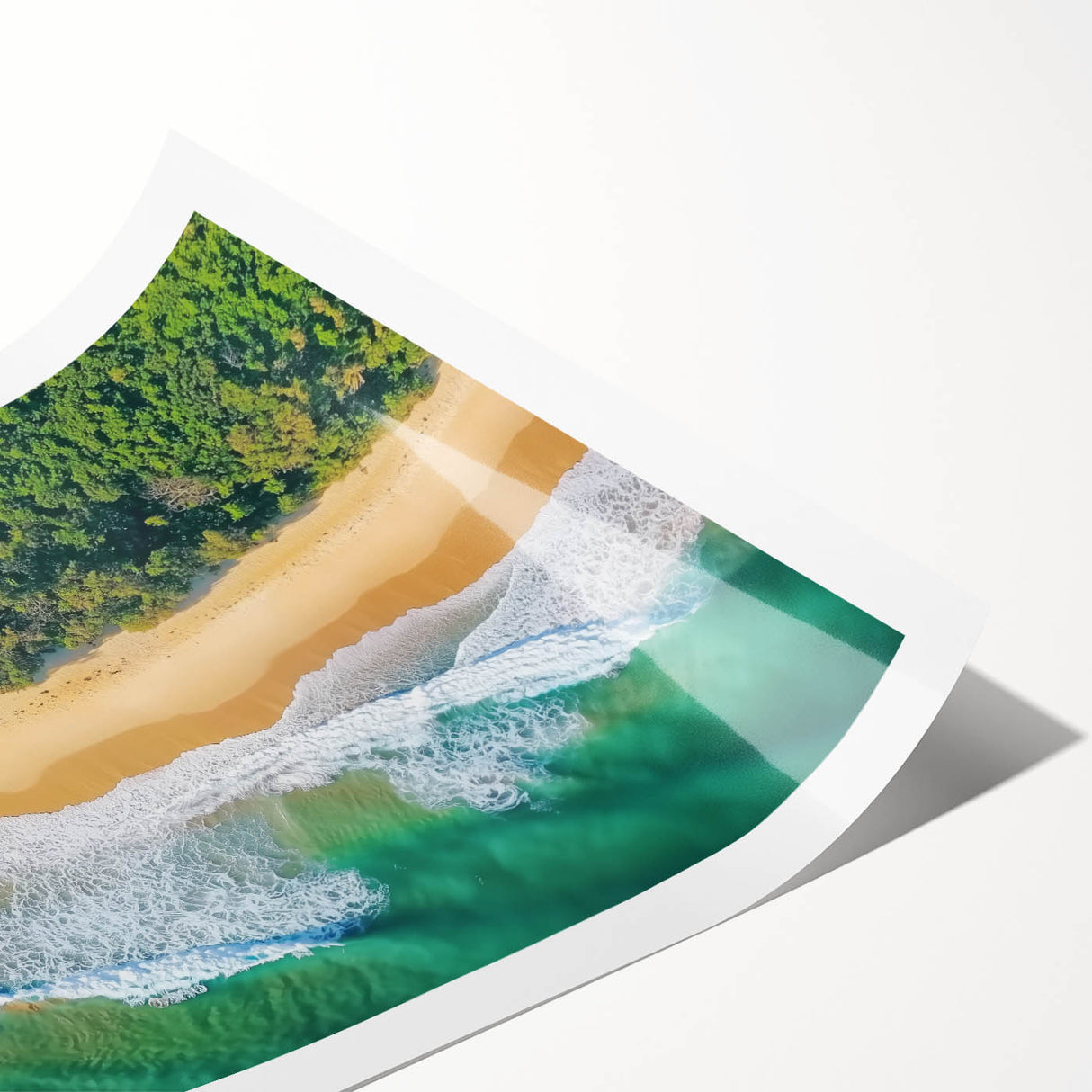 Vibrant landscape print showcasing a serene beach scene with soft waves and golden sand, rolled and secured in a protective cardboard tube for shipping.