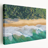 Stretched canvas artwork depicting a serene beach landscape with vibrant colors, showcasing gentle waves and a clear sky, perfect for coastal-themed decor.