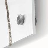 Large abstract wall art in vibrant orange and blue tones on acrylic glass.