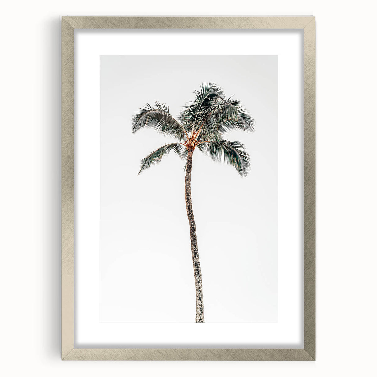Textured abstract art print in silver frame, featuring swirling gray patterns on a white background.