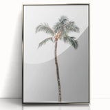 Mid-century modernist art print featuring geometric shapes in muted pastel tones on a silver-framed acrylic.