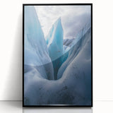 Framed acrylic artwork showcasing a dramatic landscape of cliffs against a vibrant sky, featuring black framing that enhances the visual depth and detail of the scene. Perfect for modern home decor.