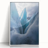 Framed acrylic artwork depicting a scenic landscape of dramatic cliffs under a vibrant sky, featuring a white frame that enhances the visual appeal, ideal for modern decor.