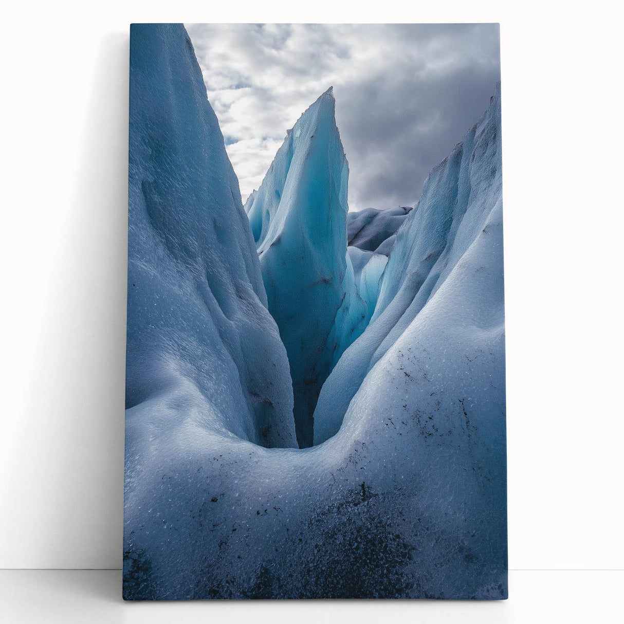 Stretched canvas artwork depicting a vibrant landscape with dramatic cliffs and lush greenery, perfect for home decor or office ambiance, showcasing nature's beauty.