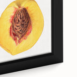 Close-up of a black framed canvas featuring colorful, textured fruits, ideal for living room decor.