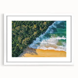 Landscape artwork featuring serene beach scene framed with a white mat, showcasing gentle waves and a clear sky, perfect for coastal home decor.