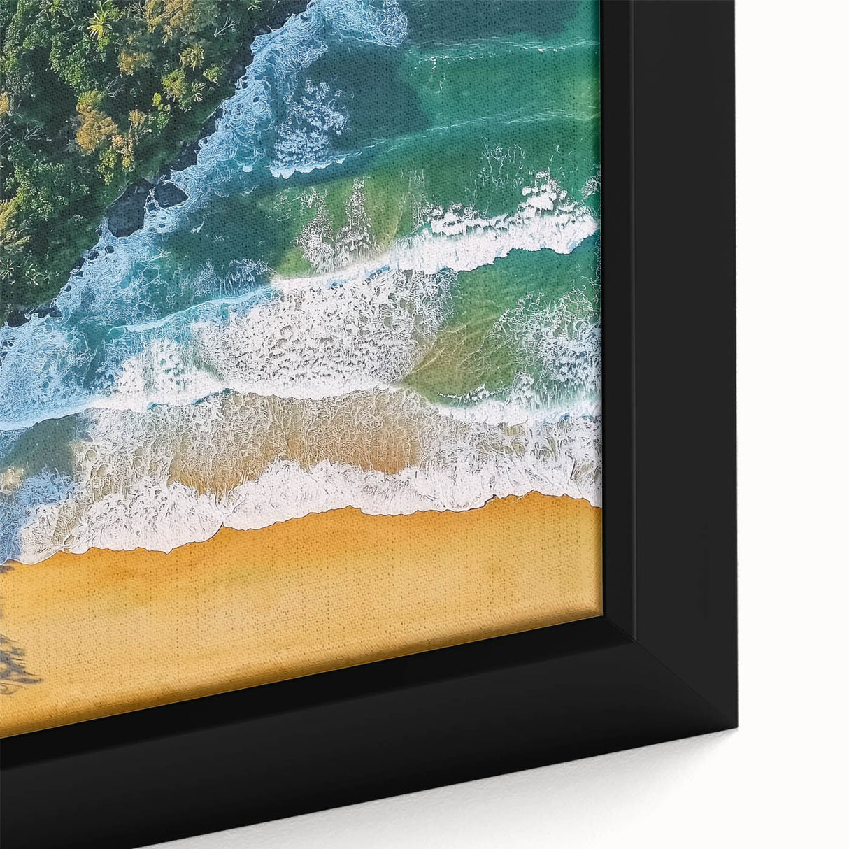 Close-up of a framed canvas depicting a serene beach landscape with soft blue skies and golden sands, ideal for coastal-themed home decor.