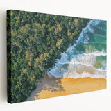 Stretched canvas art depicting a vibrant beach landscape scene, showcasing golden sands, turquoise waters, and a clear blue sky, ideal for coastal-themed decor.