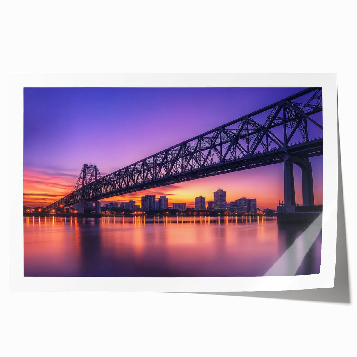 Rolled print of a landscape bridge scene, showcasing vibrant colors and detailed textures, securely packaged in a protective cardboard tube for safe shipping.