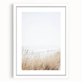 Abstract art print featuring swirling blue and green tones on a white framed canvas.