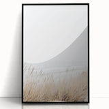 Framed acrylic print of large abstract wall art featuring mid-century modernist swirls in vibrant orange and blue tones.