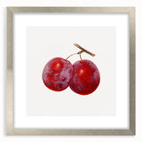 Textured art depicting an abstract array of fruits in vibrant orange and green tones, framed in silver.