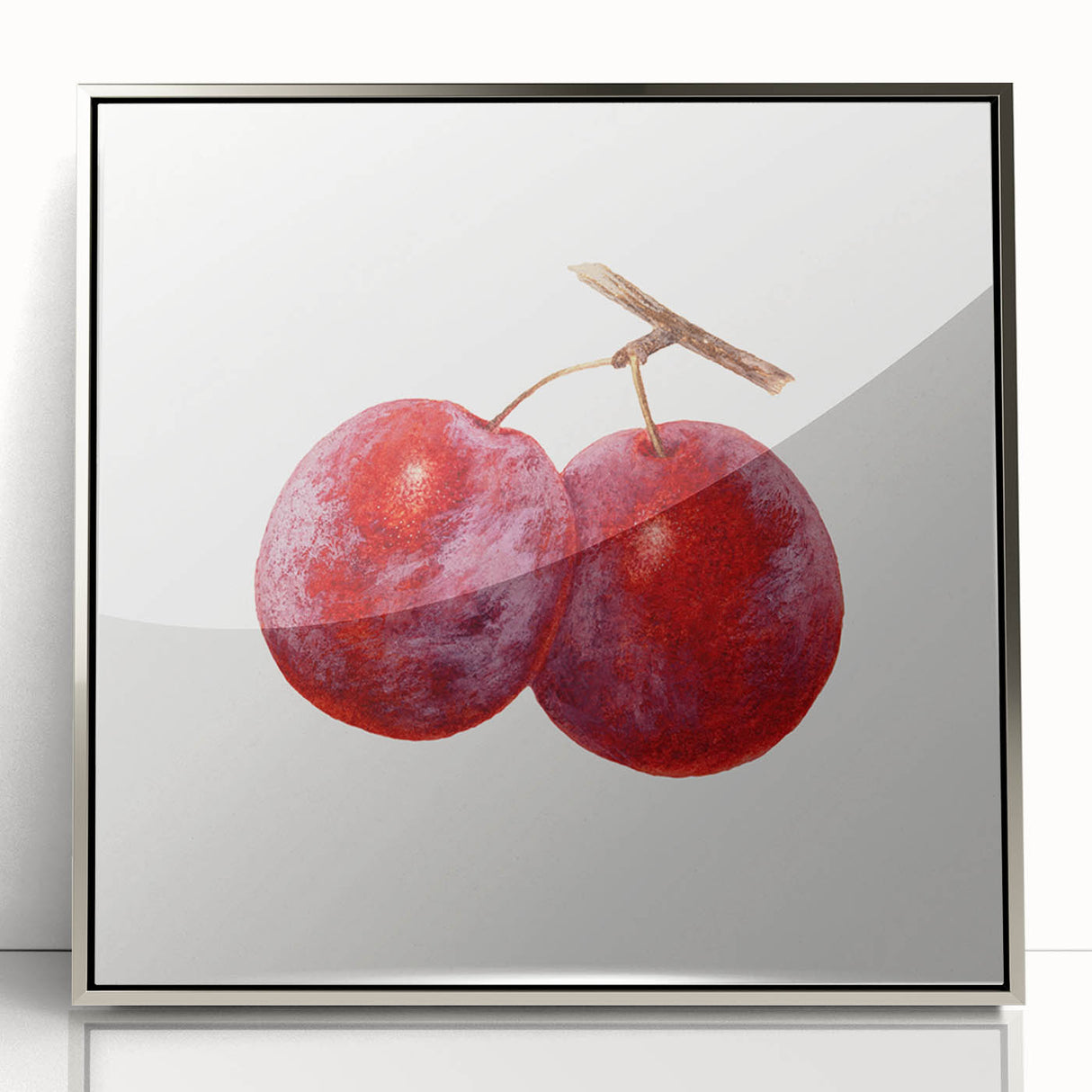 Mid-century modernist art featuring an array of fruits in vibrant colors on a silver-framed acrylic.