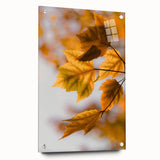 Large abstract wall art depicting fall season in vibrant orange and red tones on acrylic glass.