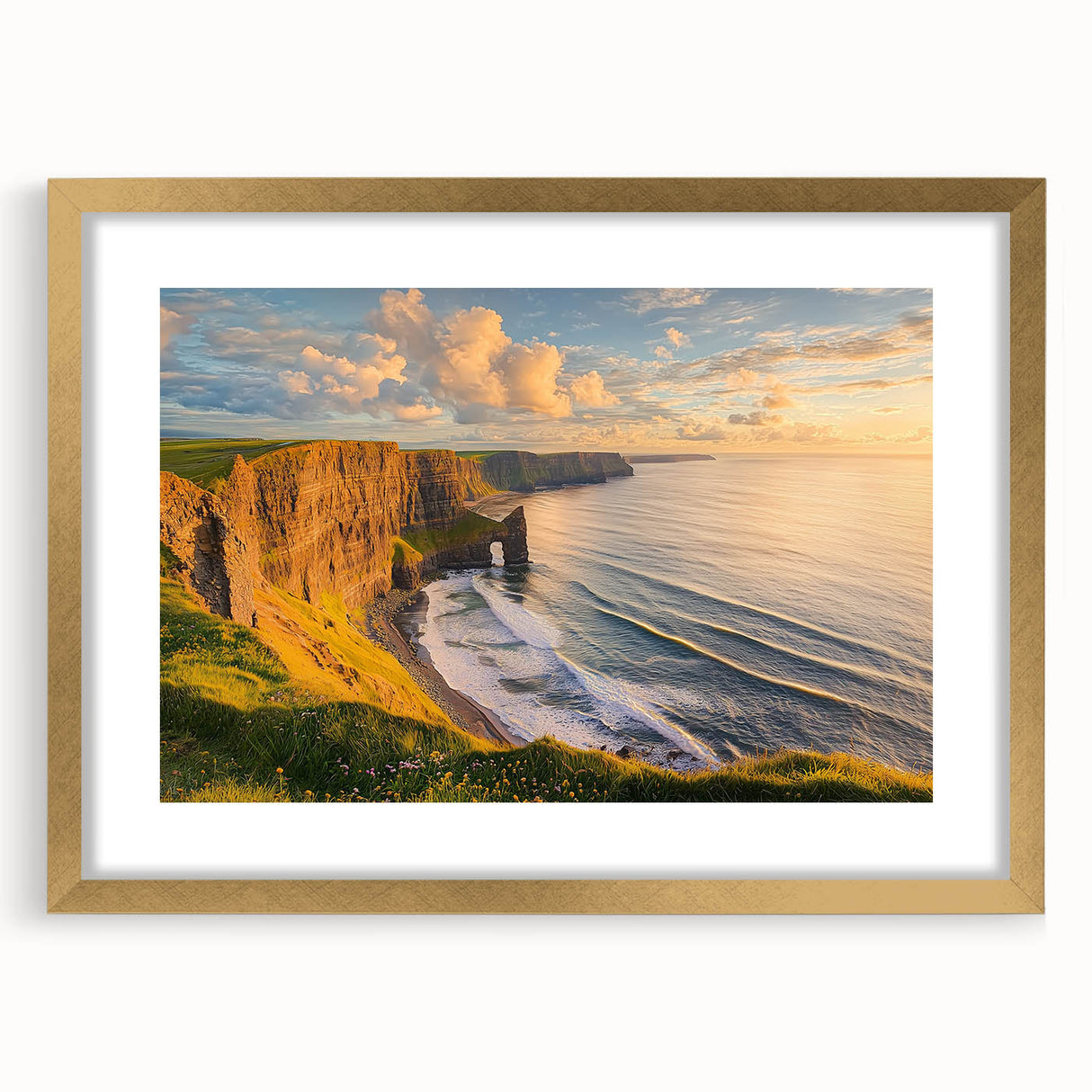 Framed landscape artwork depicting rugged cliffs and serene waters, featuring a gold mat border, perfect for enhancing any home decor with natural beauty.