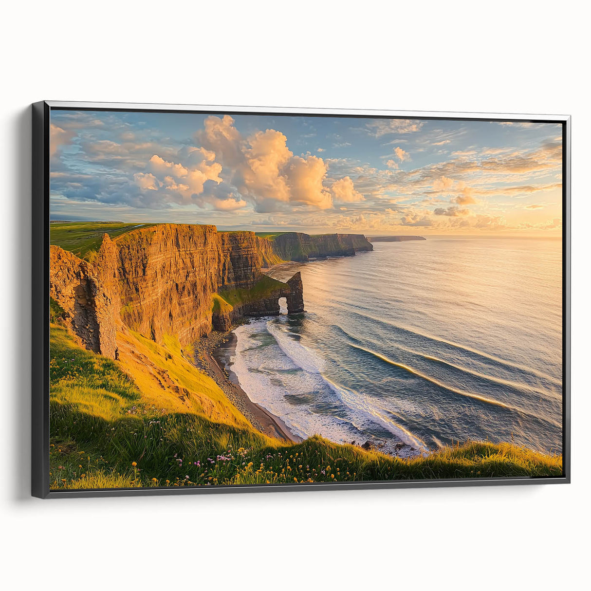 Framed canvas artwork depicting a stunning landscape of rugged cliffs under a vibrant sky, showcased in a sleek black frame, perfect for home decor enthusiasts.