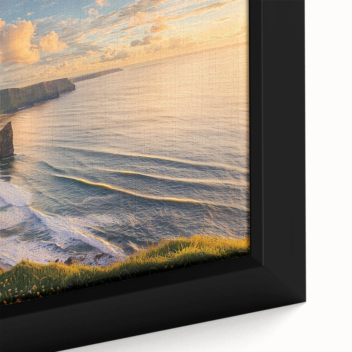 Close-up of a framed canvas print depicting a dramatic landscape of cliffs with vibrant colors, showcasing intricate details and textures for wall decor.