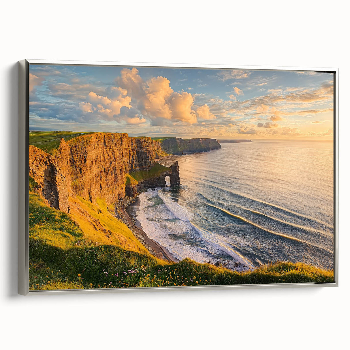 Framed canvas artwork depicting a dramatic landscape of cliffs in earthy tones, showcased with a sleek silver frame, ideal for modern home decor.