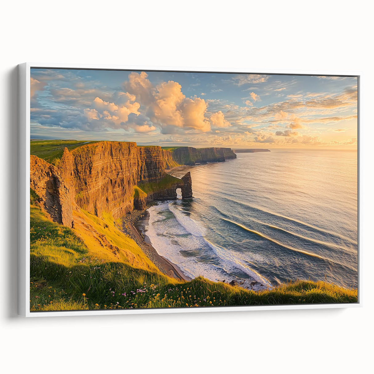 Framed canvas artwork depicting a serene landscape of majestic cliffs, showcasing vibrant colors and intricate details, mounted in a sleek white frame.
