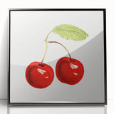 Large abstract wall art featuring assorted fruits in bold colors, framed in black acrylic, suitable for modern kitchen decor.