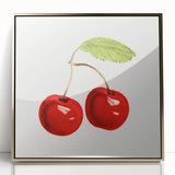 Large art print of assorted fruits in vibrant colors on a gold-framed acrylic, perfect for modern kitchen decor.