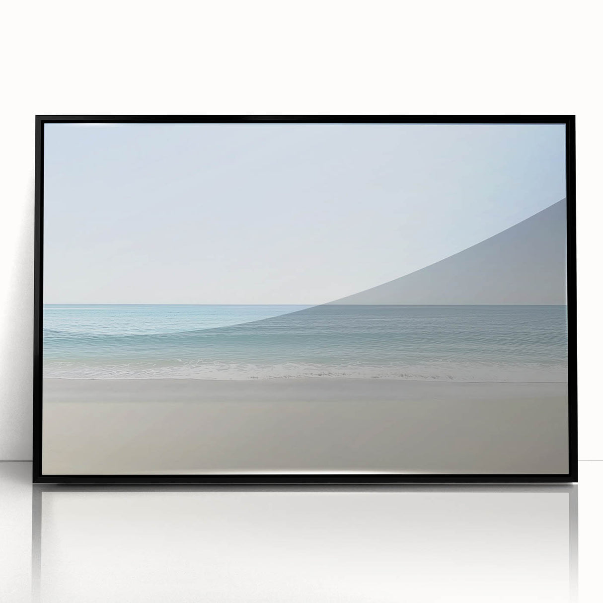 Framed acrylic wall art displaying a serene beach landscape with vibrant blues and sandy tones, encased in a sleek black frame, perfect for coastal decor.