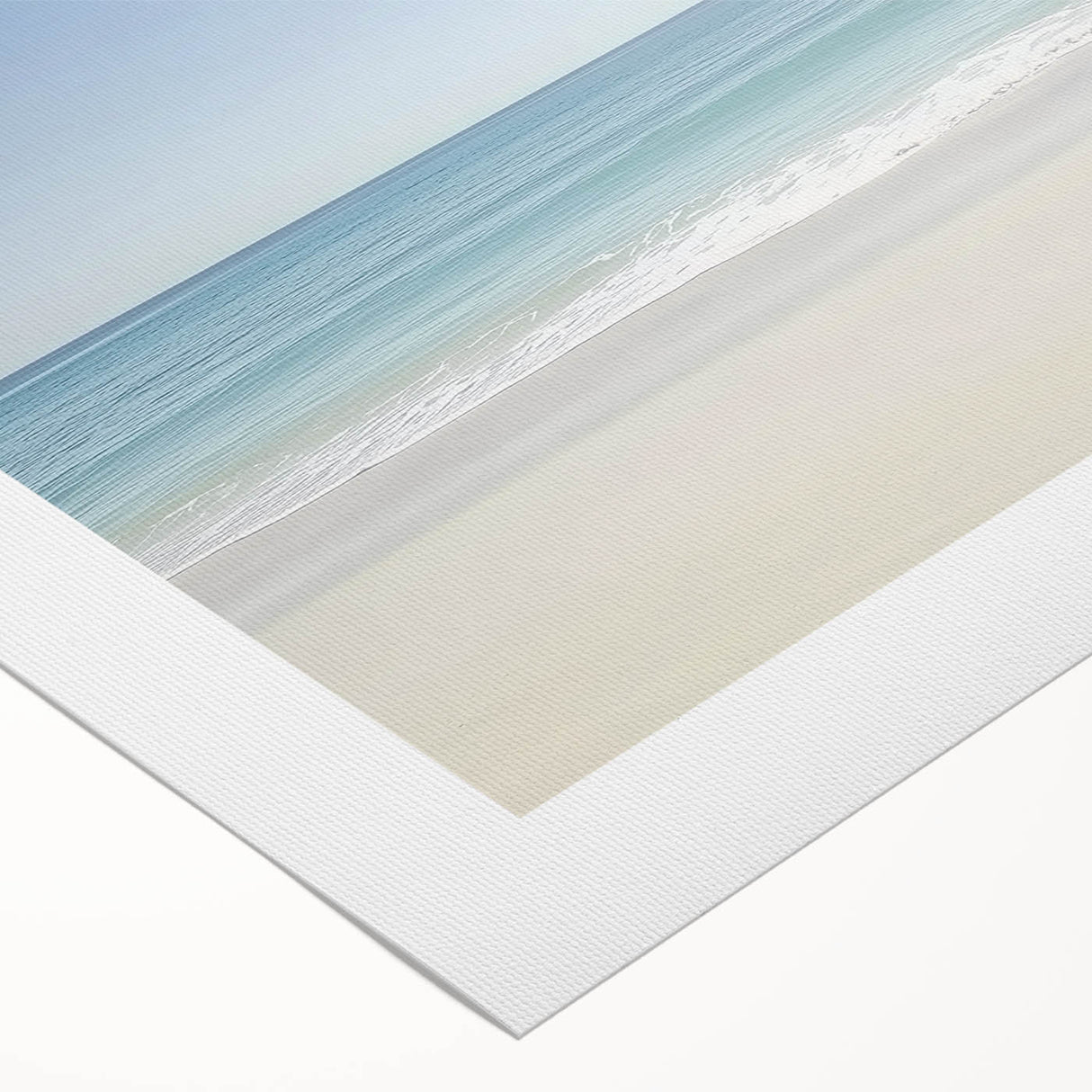 Vibrant rolled canvas artwork depicting a serene beach landscape with golden sands and turquoise waves, designed for home decor, packaged securely in a sturdy tube.