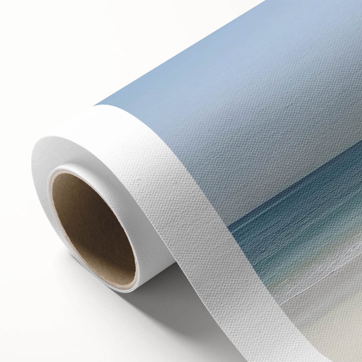 Rolled canvas featuring a serene beach landscape design with vibrant blue skies and soft waves, elegantly packaged in a protective cardboard tube for easy transport.