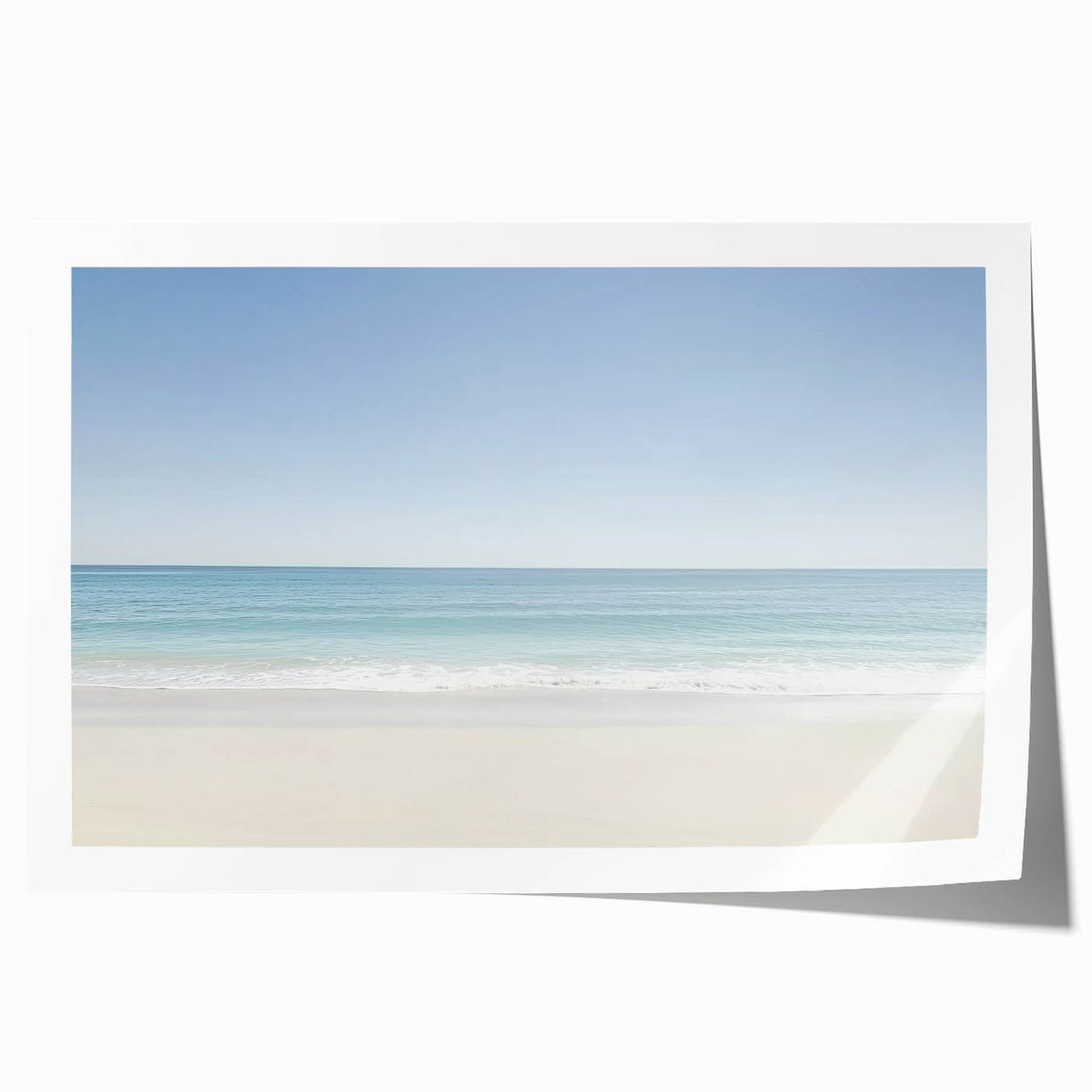 Vibrant landscape print of serene beaches showcasing soft blue waters and golden sands, expertly rolled for easy display, ideal for coastal decor enthusiasts.