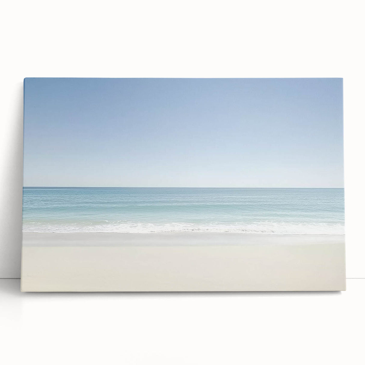 Stretched canvas artwork depicting a serene beach landscape with vibrant colors and gentle waves, perfect for coastal-themed home decor or relaxation spaces.