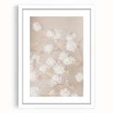 Abstract art print featuring swirling blues and greens, framed in white, suitable for bedroom or dining room decor.