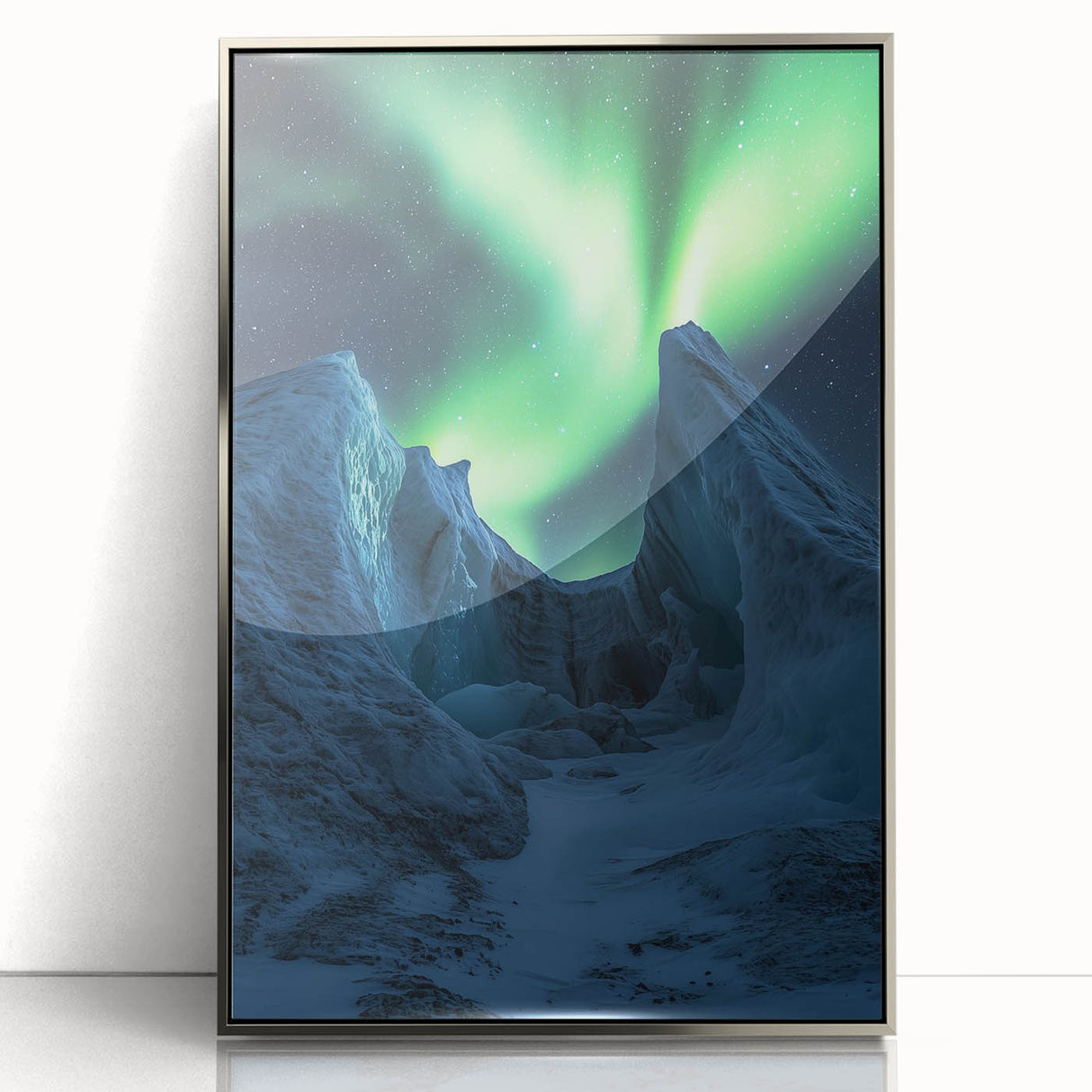 Framed acrylic artwork depicting rugged cliffs in a serene landscape, showcasing silver accents for a modern touch, ideal for home or office decor.