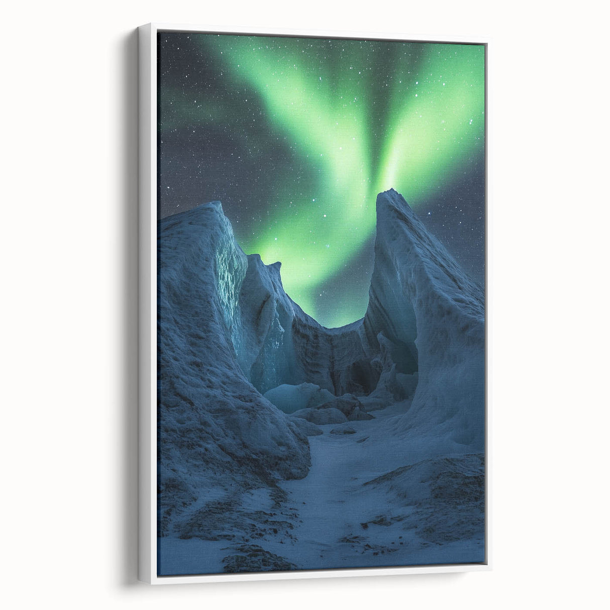 Framed canvas artwork showcasing a vibrant landscape of cliffs in a natural setting, with a sleek white frame that enhances its beauty, perfect for home décor.