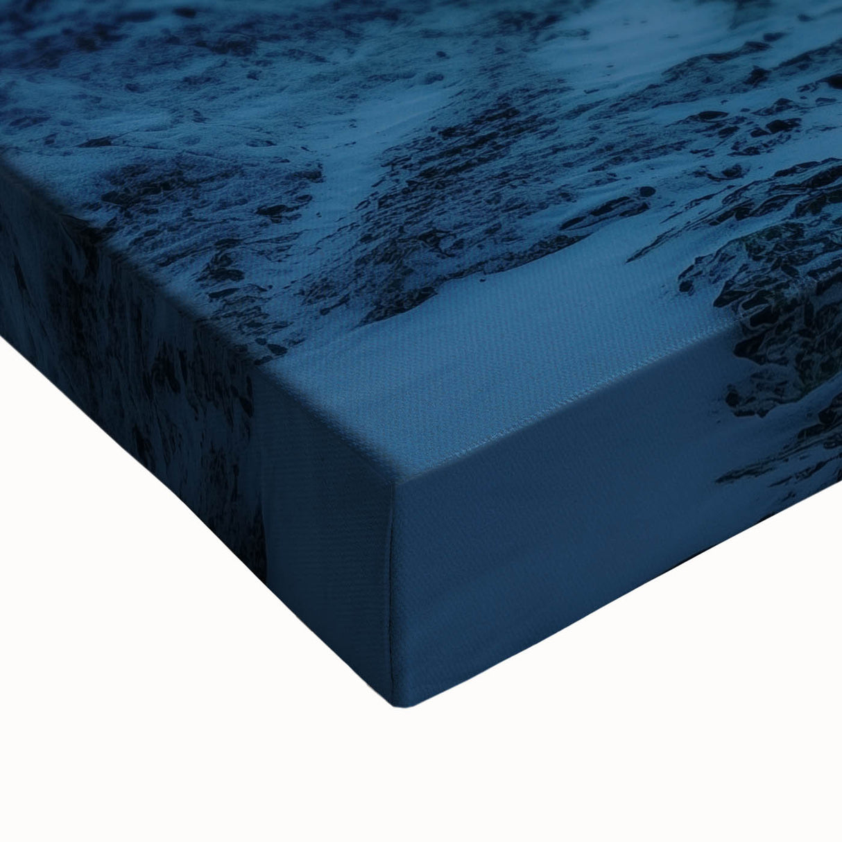Close-up of a vibrant stretched canvas artwork depicting dramatic cliffs and landscapes, showcasing rich textures and colors, perfect for home decor.