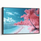 Framed canvas artwork depicting a serene beach landscape with vibrant colors, showcasing gentle waves and a clear sky, presented in a sleek black frame.