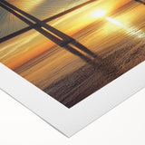 Rolled canvas artwork depicting a vibrant landscape bridge scene, showcasing intricate details and vivid colors, securely packaged in a protective cardboard tube.