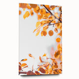 Large abstract wall art depicting autumnal trees in warm orange and red tones on acrylic glass.