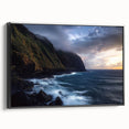 Framed canvas artwork depicting dramatic cliffs and landscapes, showcasing vibrant colors and intricate details, with a sleek black frame enhancing its modern aesthetic.