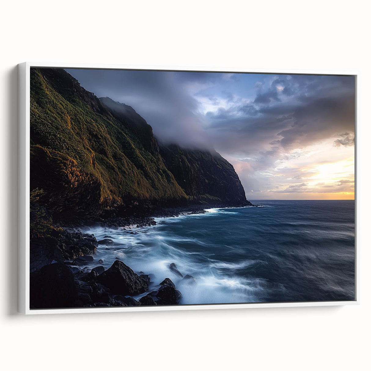Framed canvas artwork showcasing a stunning landscape of cliffs with vibrant colors, mounted in a sleek white frame, ideal for home decor and enhancing interiors.
