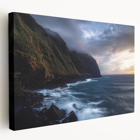 Stretched canvas artwork showcasing a breathtaking view of rugged cliffs against a vibrant sunset, emphasizing natural beauty and tranquility in home decor.