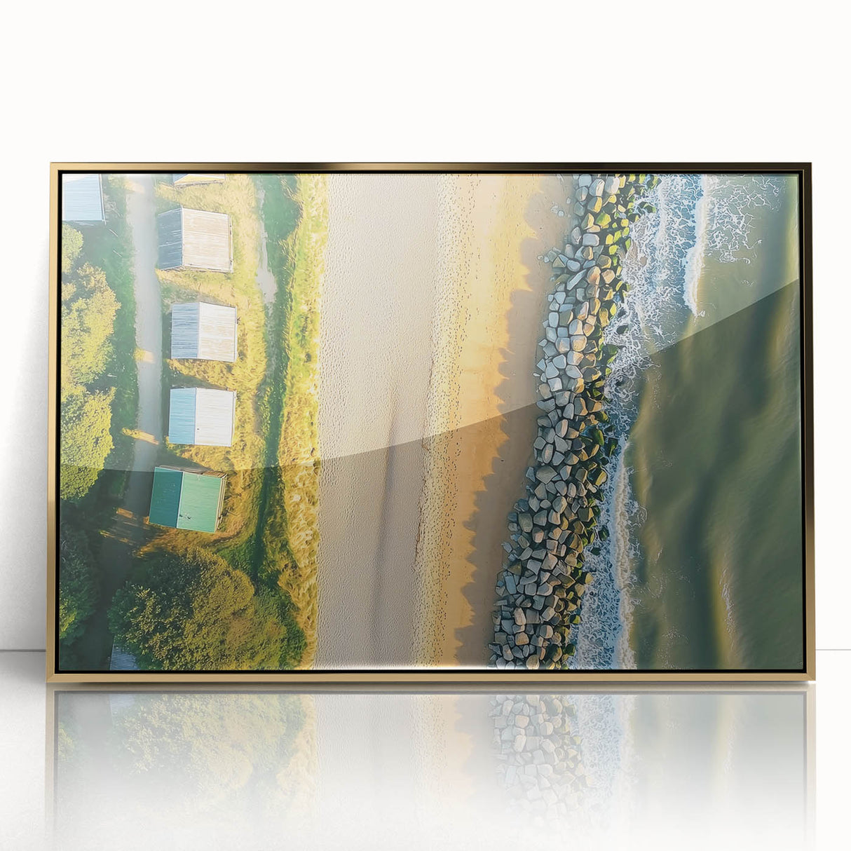 Framed acrylic landscape artwork showcasing a serene beach scene with golden tones, ideal for enhancing home decor and creating a calming atmosphere.