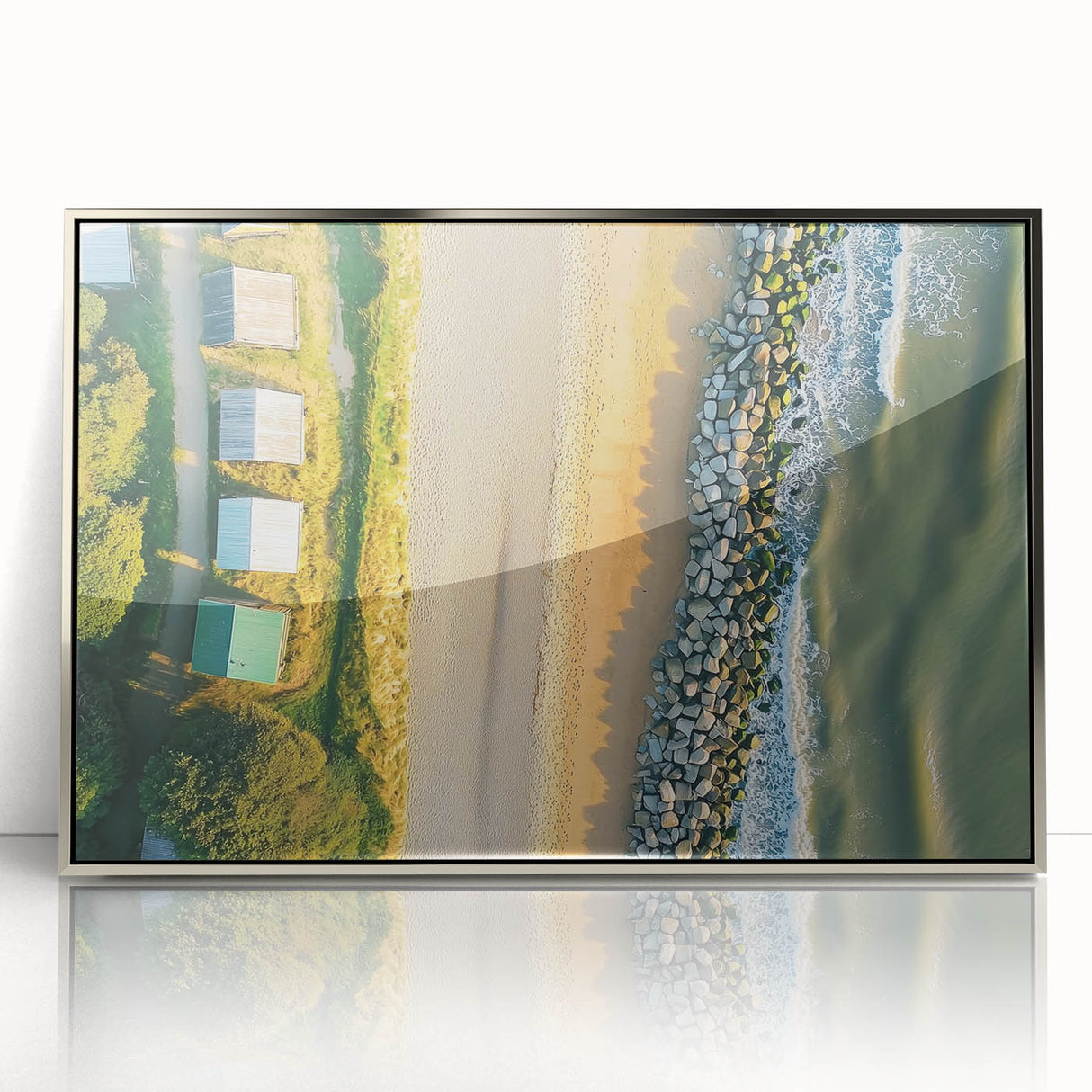 Framed acrylic artwork depicting a serene beach landscape with soft waves and a clear blue sky, showcasing vibrant colors and intricate details, perfect for coastal decor.