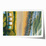 Vibrant rolled landscape print showcasing a serene beach scene with golden sands and turquoise waves, elegantly packaged in a protective cardboard tube. Ideal for home decor.