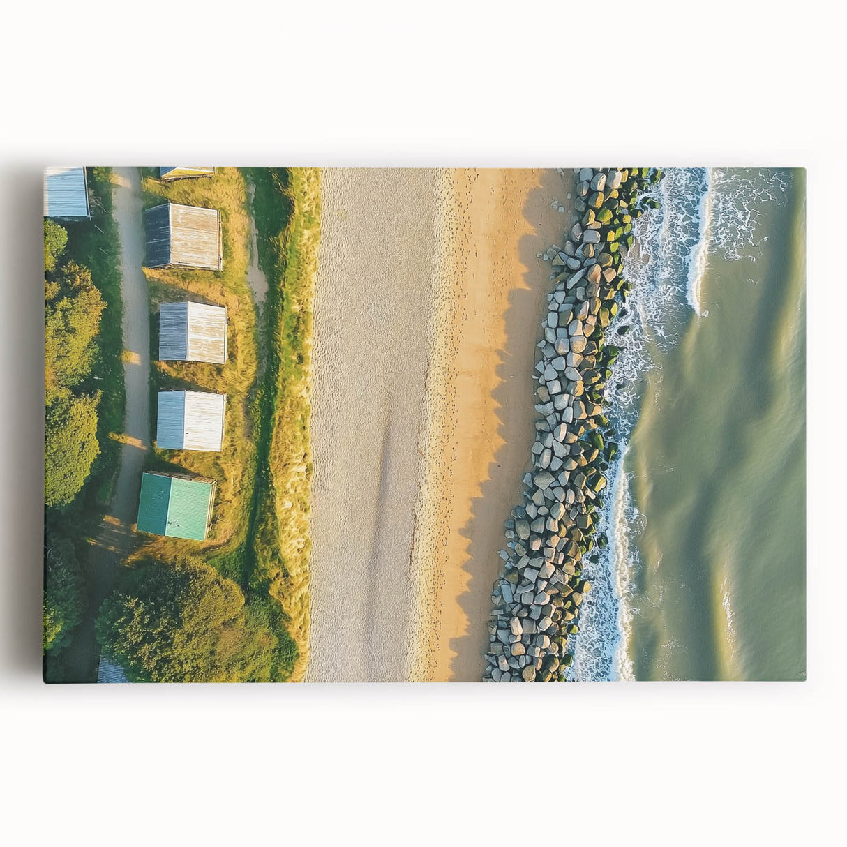 Stretched canvas artwork depicting a serene beach landscape with vibrant colors and gentle waves, perfect for enhancing coastal-themed decor in homes or offices.