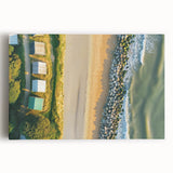 Stretched canvas artwork depicting a serene beach landscape with vibrant colors and gentle waves, perfect for enhancing coastal-themed decor in homes or offices.