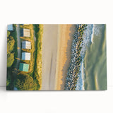 Stretched canvas artwork depicting a serene beach landscape with soft pastel colors, perfect for coastal-themed home decor, enhancing tranquility in any room.