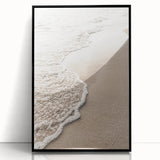 Large abstract wall art in vibrant orange and blue tones, framed in black acrylic, suitable for modern living room decor.