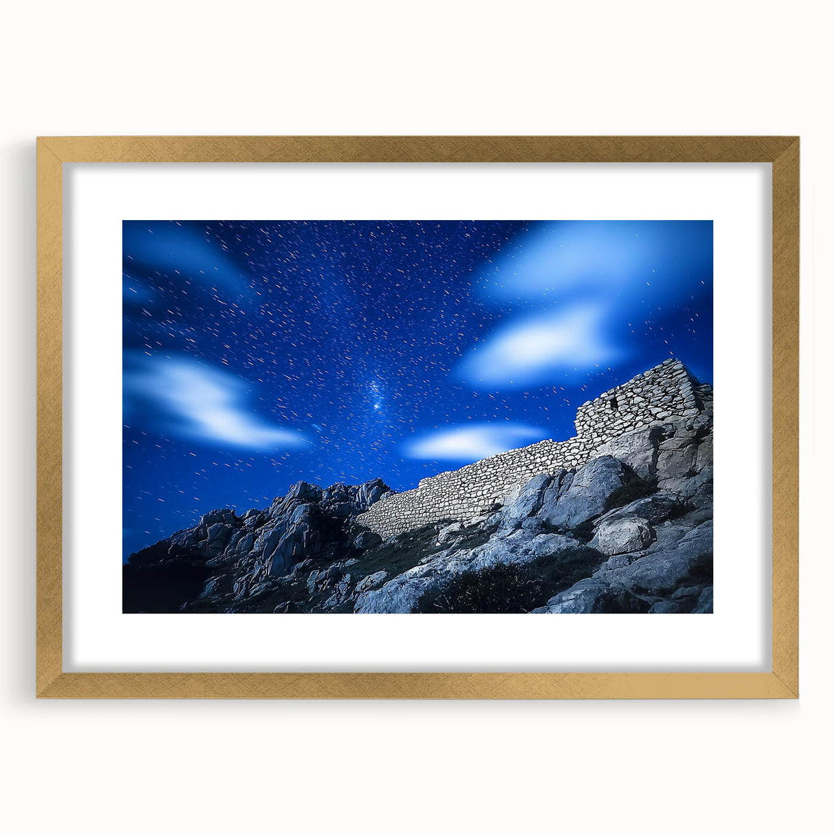Gold-framed landscape artwork showcasing dramatic cliffs and a serene ocean view, elegantly matted for enhanced presentation, ideal for home decor.