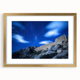 Gold-framed landscape artwork showcasing dramatic cliffs and a serene ocean view, elegantly matted for enhanced presentation, ideal for home decor.
